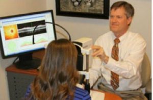 doctor testing eyes of patient